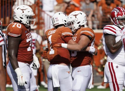 Sep 4, 2021; Austin, Texas, USA; Texas Longhorns tight end Cade Brewer (80) hugs quarterback Hudson Card (1) after catching a touchdown pass in the first half of the game against the Louisiana Ragin' Cajuns at Darrell K Royal-Texas Memorial Stadium. Mandatory Credit: Scott Wachter-USA TODAY Sports