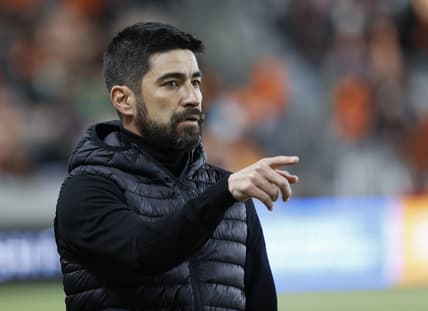 Feb 27, 2022; Houston, Texas, USA; Houston Dynamo FC head coach Paulo Nagamura reacts during the first half against the Real Salt Lake at PNC Stadium. Mandatory Credit: Troy Taormina-USA TODAY Sports
