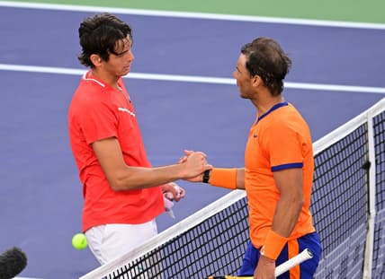 Mar 20, 2022; Indian Wells, CA, USA;   Taylor Fritz (USA) shakes hands with Rafael Nadal (ESP) after winning the men's final at the BNP Paribas Open at the Indian Wells Tennis Garden. Mandatory Credit: Jayne Kamin-Oncea-USA TODAY Sports