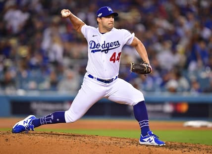 Oct 12, 2022; Los Angeles, California, USA; Los Angeles Dodgers relief pitcher Tommy Kahnle (44) throws during the ninth inning of game two of the NLDS for the 2022 MLB Playoffs against the San Diego Padres at Dodger Stadium. Mandatory Credit: Gary A. Vasquez-USA TODAY Sports