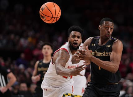 Feb 26, 2023; College Park, Maryland, USA; Maryland Terrapins forward Donta Scott (24) knocks the ball out of the hands of Northwestern Wildcats guard Chase Audige (1) in the first half at Xfinity Center. Mandatory Credit: Brent Skeen-USA TODAY Sports
