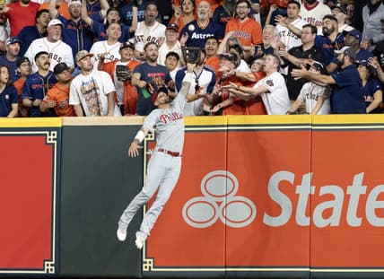 Apr 28, 2023; Houston, Texas, USA; Philadelphia Phillies right fielder Nick Castellanos (8) catches Houston Astros third baseman Alex Bregman (2) (not pictured) fly ball for an out in the first inning at Minute Maid Park. Mandatory Credit: Thomas Shea-USA TODAY Sports