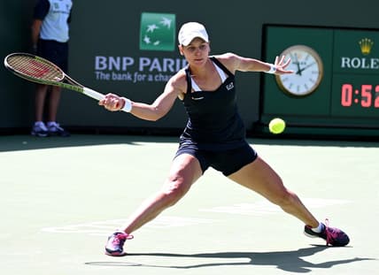 Mar 17, 2022; Indian Wells, CA, USA;   Veronika Kudermetova (RUS) hits a shot against Paula Badosa (ESP) at the BNP Paribas Open at the Indian Wells Tennis Garden. Mandatory Credit: Jayne Kamin-Oncea-USA TODAY Sports