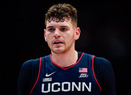 Dec 1, 2023; Lawrence, Kansas, USA; Connecticut Huskies center Donovan Clingan (32) during the first half against the Kansas Jayhawks at Allen Fieldhouse. Mandatory Credit: Jay Biggerstaff-USA TODAY Sports