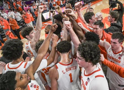 Feb 14, 2024; Clemson, South Carolina, USA; Clemson celebrates after the game with Miami at Littlejohn Coliseum Wednesday, February 14, 2024.  Chase Hunter led the Tigers with 20 points in their 77-60 win.  Mandatory Credit: Ken Ruinard-USA TODAY Sports