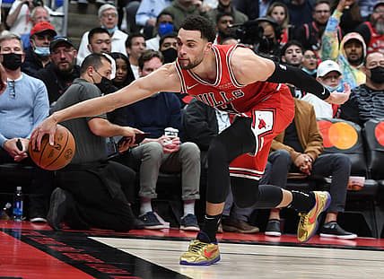 Oct 25, 2021; Toronto, Ontario, CAN; Chicago Bulls guard Zach LaVine (8) reaches for a loose ball in the second half against Toronto Raptors at Scotiabank Arena. Mandatory Credit: Dan Hamilton-USA TODAY Sports