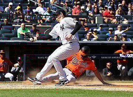 Sep 4, 2021; Bronx, New York, USA; Baltimore Orioles designated hitter Trey Mancini (16) scores a run on a wild pitch as y47 drops the ball during the fourth inning at Yankee Stadium. Mandatory Credit: Andy Marlin-USA TODAY Sports