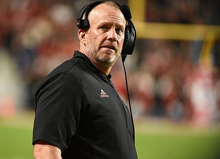 Nov 12, 2022; Raleigh, North Carolina, USA;  North Carolina State Wolfpack head coach Dave Doeren watches a replay on the scoreboard during the second half against the Boston College Eagles  at Carter-Finley Stadium. The Eagles won 21-20. Mandatory Credit: Rob Kinnan-USA TODAY Sports