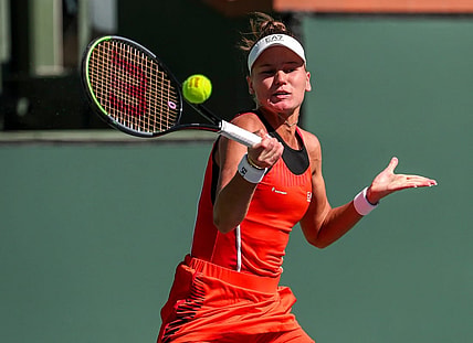 Veronika Kudermetova of Russia returns the ball while playing with doubles partner Elena Rybakina of Kazakhstan against Su-Wei Hsieh of Taiwan and Elise Mertens of Belgium during the women's doubles final of the BNP Paribas Open at the Indian Wells Tennis Garden, Saturday, Oct. 16, 2021, in Indian Wells, Calif.