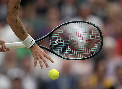Jul 15, 2023; London, United Kingdom; Marketa Vondrousova (CZE) bounces the ball prior to serving during the women   s final against Ons Jabeur (TUN) on day 13 at the All England Lawn Tennis and Croquet Club. Mandatory Credit: Susan Mullane-USA TODAY Sports