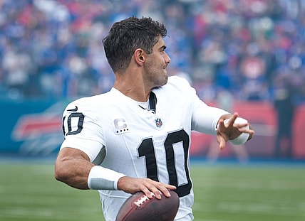 Sep 17, 2023; Orchard Park, New York, USA; Las Vegas Raiders quarterback Jimmy Garoppolo (10) warms up before a game against the Buffalo Bills at Highmark Stadium. Mandatory Credit: Mark Konezny-USA TODAY Sports