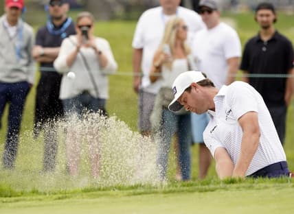 Jun 20, 2021; San Diego, California, USA; Harris English plays a shot from a bunker on the first hole during the final round of the U.S. Open golf tournament at Torrey Pines Golf Course. Mandatory Credit: Michael Madrid-USA TODAY Sports
