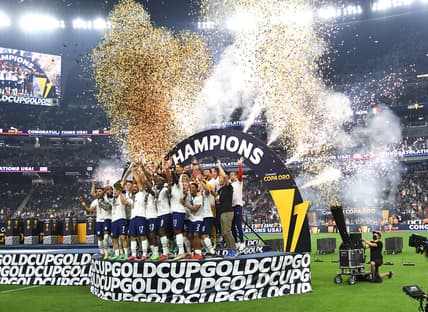 Aug 1, 2021; Las Vegas, Nevada, USA; USA players celebrate after defeating Mexico 1-0 in extra time to win the CONCACAF Gold Cup final soccer match at Allegiant Stadium. Mandatory Credit: Stephen R. Sylvanie-USA TODAY Sports