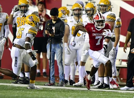 Sep 11, 2021; Bloomington, Indiana, USA; Indiana Hoosiers wide receiver D.J. Matthews Jr. (7) runs the ball to the end zone on a kickoff against the Idaho Vandals during the second quarter at Memorial Stadium. Mandatory Credit: Marc Lebryk-USA TODAY Sports