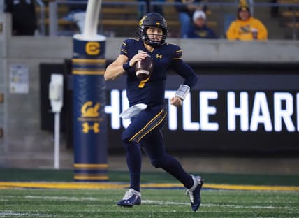 Oct 30, 2021; Berkeley, California, USA; California Golden Bears quarterback Chase Garbers (7) scrambles during the third quarter against the Oregon State Beavers at FTX Field at California Memorial Stadium. Mandatory Credit: Kelley L Cox-USA TODAY Sports