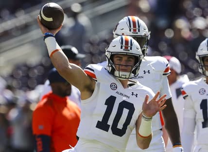 Nov 6, 2021; College Station, Texas, USA;  Auburn Tigers quarterback Bo Nix (10) warms up before playing against the Texas A&M Aggies at Kyle Field. Mandatory Credit: Thomas Shea-USA TODAY Sports