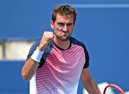 Aug 9, 2021; Toronto, Ontario, Canada; Marin Cilic of Croatia reacts to winning a point against Albert Ramos-Vinolas of Spain in first round play at Aviva Centre. Mandatory Credit: Dan Hamilton-USA TODAY Sports