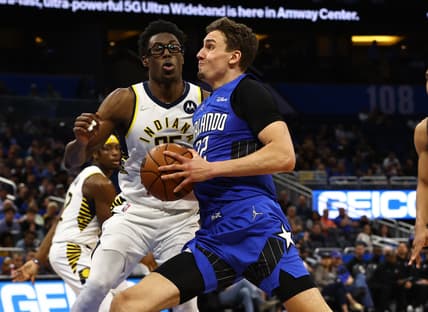 Mar 2, 2022; Orlando, Florida, USA ; Orlando Magic forward Franz Wagner (22) moves to the basket as Indiana Pacers forward Jalen Smith (25) defends during the second half at Amway Center. Mandatory Credit: Kim Klement-USA TODAY Sports