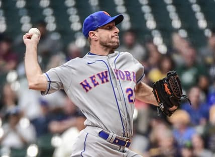 Sep 19, 2022; Milwaukee, Wisconsin, USA; New York Mets pitcher Max Scherzer (21) throws a pitch in the first inning against the Milwaukee Brewers at American Family Field. Mandatory Credit: Benny Sieu-USA TODAY Sports