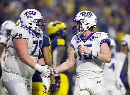 Dec 31, 2022; Glendale, Arizona, USA; TCU Horned Frogs offensive lineman Wes Harris (78) celebrates a touchdown with quarterback Max Duggan (15) against the Michigan Wolverines during the 2022 Fiesta Bowl at State Farm Stadium. Mandatory Credit: Mark J. Rebilas-USA TODAY Sports
