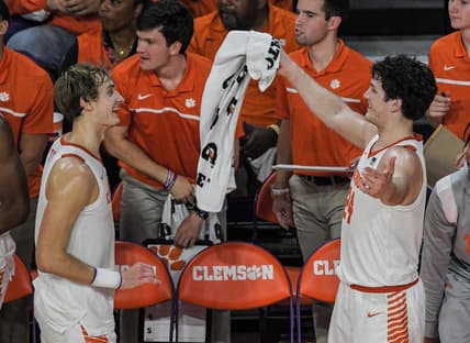 Clemson forward Hunter Tyson (5) and Clemson sophomore forward PJ Hall (24) celebrate in the closing second of the second half against Wake Forest at Littlejohn Coliseum Friday, December 2, 2022.

Clemson Basketball Vs Wake Forest University Acc