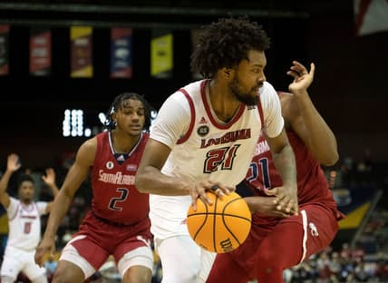 Louisiana's Jordan Brown (No. 21) takes it to the board during Monday's SBC Men's Championship game at the Pensacola Bay Center.

Sbc Men S Basketball Usa Vs Louisiana