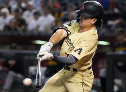 July 7, 2023; Phoenix, AZ, USA; Arizona Diamondbacks' Corbin Carroll (7) hits a single against the Pittsburgh Pirates at Chase Field.