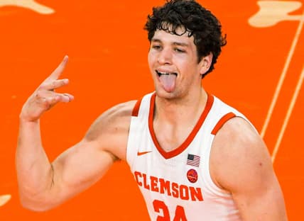 Clemson sophomore forward PJ Hall (24) reacts after making a three-point shot against Wake Forest during the second half at Littlejohn Coliseum.