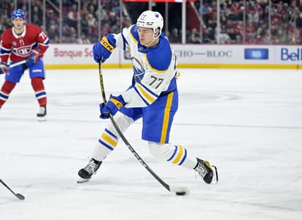 Jan 4, 2024; Montreal, Quebec, CAN; Buffalo Sabres forward JJ Peterka (77) takes a shot on the Montreal Canadiens net during the first period at the Bell Centre. Mandatory Credit: Eric Bolte-USA TODAY Sports