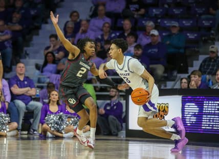 Jan 30, 2024; Manhattan, Kansas, USA; Kansas State Wildcats guard Dorian Finister (3) dribbles against Oklahoma Sooners guard Javian McCollum (2) during the second half at Bramlage Coliseum. Mandatory Credit: Scott Sewell-USA TODAY Sports