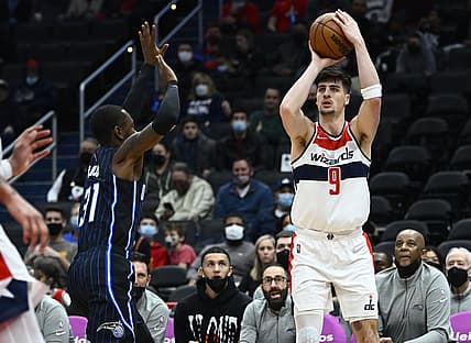 Jan 12, 2022; Washington, District of Columbia, USA; Washington Wizards forward Deni Avdija (9) shoots over Orlando Magic guard Terrence Ross (31) during the first half at Capital One Arena. Mandatory Credit: Brad Mills-USA TODAY Sports