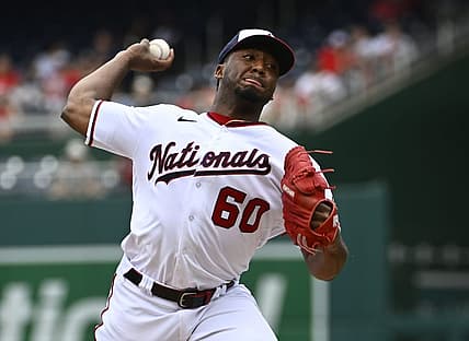 Jun 17, 2022; Washington, District of Columbia, USA; Washington Nationals pitcher Joan Adon (60) throws to the Philadelphia Phillies during the first inning at Nationals Park. Mandatory Credit: Brad Mills-USA TODAY Sports