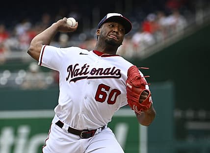 Jun 17, 2022; Washington, District of Columbia, USA; Washington Nationals pitcher Joan Adon (60) throws to the Philadelphia Phillies during the first inning at Nationals Park. Mandatory Credit: Brad Mills-USA TODAY Sports
