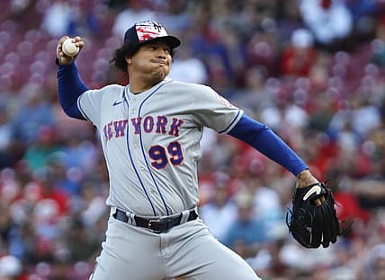 Jul 4, 2022; Cincinnati, Ohio, USA; New York Mets starting pitcher Taijuan Walker (99) throws a pitch against the Cincinnati Reds during the first inning at Great American Ball Park. Mandatory Credit: David Kohl-USA TODAY Sports