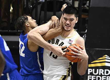 Dec 7, 2022; West Lafayette, Indiana, USA; Purdue Boilermakers center Zach Edey (15) and Hofstra Pride forward Nelson Boachie-Yiadom (32) fight for a ball during the second half at Mackey Arena. Boilermakers defeated the Pride 85-66. Mandatory Credit: Marc Lebryk-USA TODAY Sports