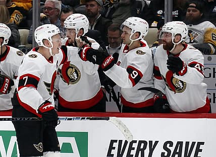 Oct 28, 2023; Pittsburgh, Pennsylvania, USA; Ottawa Senators left wing Brady Tkachuk (7) celebrates with the bench after scoring his second goal of the game against the Pittsburgh Penguins during the third period at PPG Paints Arena.  Ottawa won 5-2. Mandatory Credit: Charles LeClaire-USA TODAY Sports