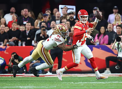 Feb 11, 2024; Paradise, Nevada, USA; Kansas City Chiefs quarterback Patrick Mahomes (15) is pressured by San Francisco 49ers defensive end Chase Young (92) in the first half in Super Bowl LVIII at Allegiant Stadium. Mandatory Credit: Mark J. Rebilas-USA TODAY Sports