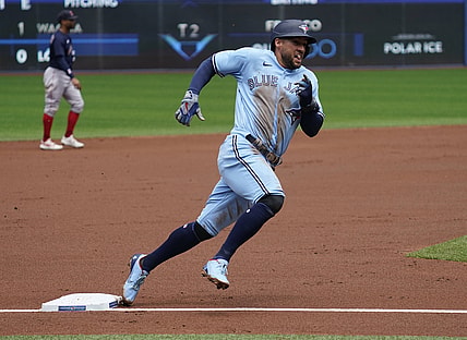 Aug 8, 2021; Toronto, Ontario, CAN; Toronto Blue Jays center fielder George Springer (4) heads for home on a single by designated hitter Corey Dickerson (not pictured) against the Boston Red Sox in the first inning at Rogers Centre. Mandatory Credit: John E. Sokolowski-USA TODAY Sports