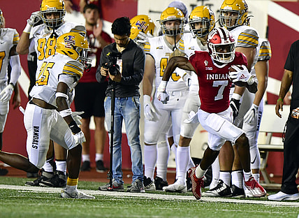 Sep 11, 2021; Bloomington, Indiana, USA; Indiana Hoosiers wide receiver D.J. Matthews Jr. (7) runs the ball to the end zone on a kickoff against the Idaho Vandals during the second quarter at Memorial Stadium. Mandatory Credit: Marc Lebryk-USA TODAY Sports