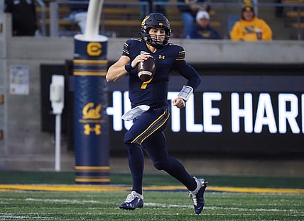 Oct 30, 2021; Berkeley, California, USA; California Golden Bears quarterback Chase Garbers (7) scrambles during the third quarter against the Oregon State Beavers at FTX Field at California Memorial Stadium. Mandatory Credit: Kelley L Cox-USA TODAY Sports