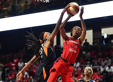 Oct 1, 2019; Washington, DC, USA; Connecticut Sun forward Jonquel Jones (35) blocks the shot by Washington Mystics guard Shatori Walker-Kimbrough (32) during the second quarter in game two of the 2019 WNBA Finals at The Entertainment and Sports Arena. Mandatory Credit: Brad Mills-USA TODAY Sports