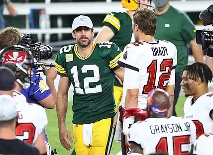 Oct 18, 2020; Tampa, Florida, USA; Tampa Bay Buccaneers quarterback Tom Brady (right) greets Green Bay Packers quarterback Aaron Rodgers (left) after a NFL game at Raymond James Stadium. Mandatory Credit: Kim Klement-USA TODAY Sports
