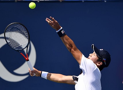 Aug 4, 2019; Montreal, Quebec, Canada; Soonwoo Kwon of South Korea serves against John Millman of Australia (not pictured) during the Rogers Cup tennis tournament at Stade IGA. Mandatory Credit: Eric Bolte-USA TODAY Sports