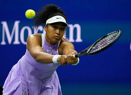 Aug 30, 2022; Flushing, NY, USA;    NaomiOsaka of Japan hits to Danielle Collins of the USA on day two of the 2022 U.S. Open tennis tournament at USTA Billie Jean King National Tennis Center. Mandatory Credit: Robert Deutsch-USA TODAY Sports
