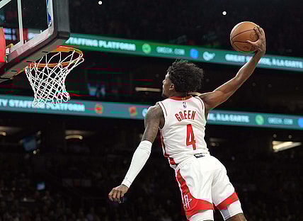 Feb 29, 2024; Phoenix, Arizona, USA; Houston Rockets guard Jalen Green (4) dunks against the Phoenix Suns during the first half at Footprint Center. Mandatory Credit: Joe Camporeale-USA TODAY Sports