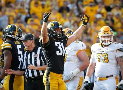Iowa junior linebacker Jack Campbell reacts after tackling Kent State quarterback Dustin Crum in the third quarter at Kinnick Stadium in Iowa City on Saturday, Sept. 18, 2021.

20210918 Iowavskentstate