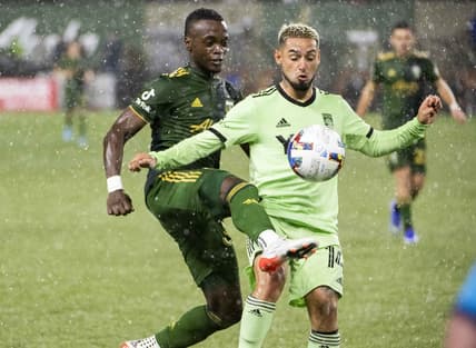 Mar 12, 2022; Portland, Oregon, USA; Portland Timbers midfielder Santiago Moreno (30) attacks Austin FC forward Diego Fag  ndez (14) during the second half at Providence Park. The Timbers won the game 1-0. Mandatory Credit: Troy Wayrynen-USA TODAY Sports