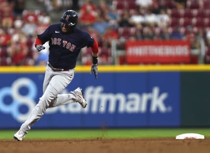 Sep 20, 2022; Cincinnati, Ohio, USA; Boston Red Sox designated hitter J.D. Martinez (28) rounds the bases after hitting and RBI triple against the Cincinnati Reds during the third inning at Great American Ball Park. Mandatory Credit: David Kohl-USA TODAY Sports