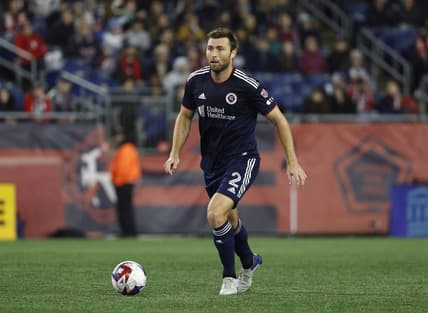 Apr 1, 2023; Foxborough, Massachusetts, USA; New England Revolution defender Dave Romney (2) against New York City FC during the first half at Gillette Stadium. Mandatory Credit: Winslow Townson-USA TODAY Sports