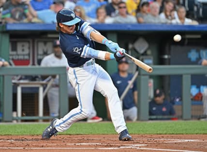 Sep 1, 2023; Kansas City, Missouri, USA;  Kansas City Royals shortstop Bobby Witt Jr. (7) hits a solo home run in the first inning against the Boston Red Sox at Kauffman Stadium. Mandatory Credit: Peter Aiken-USA TODAY Sports